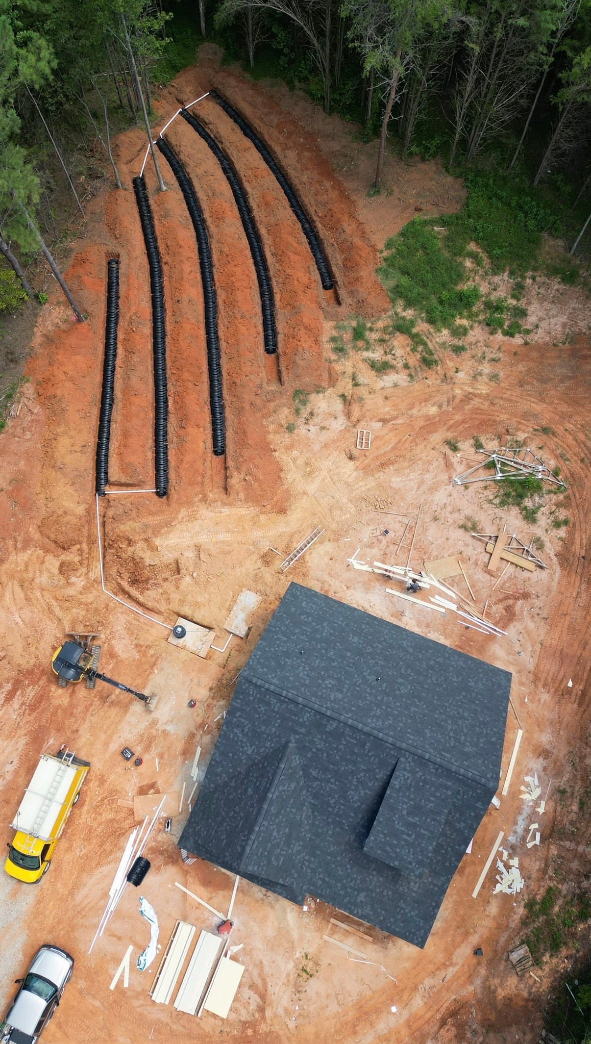 Aerial drone view of septic drain field installation at new home construction site in NC